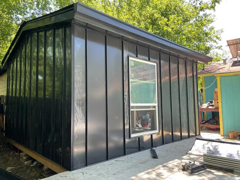 Black standing seam metal wall panels for Roof Inspection in South Bend
